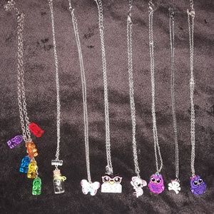 NEW CONDITION: Silver necklaces 8 assorted.